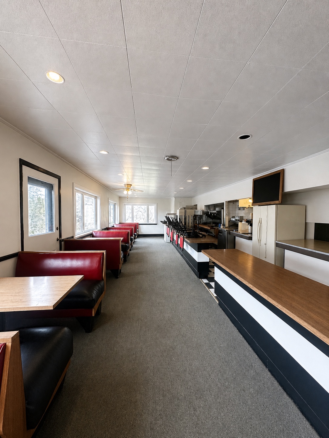 KC's Corner Restaurant dining room with booths and counter seating
